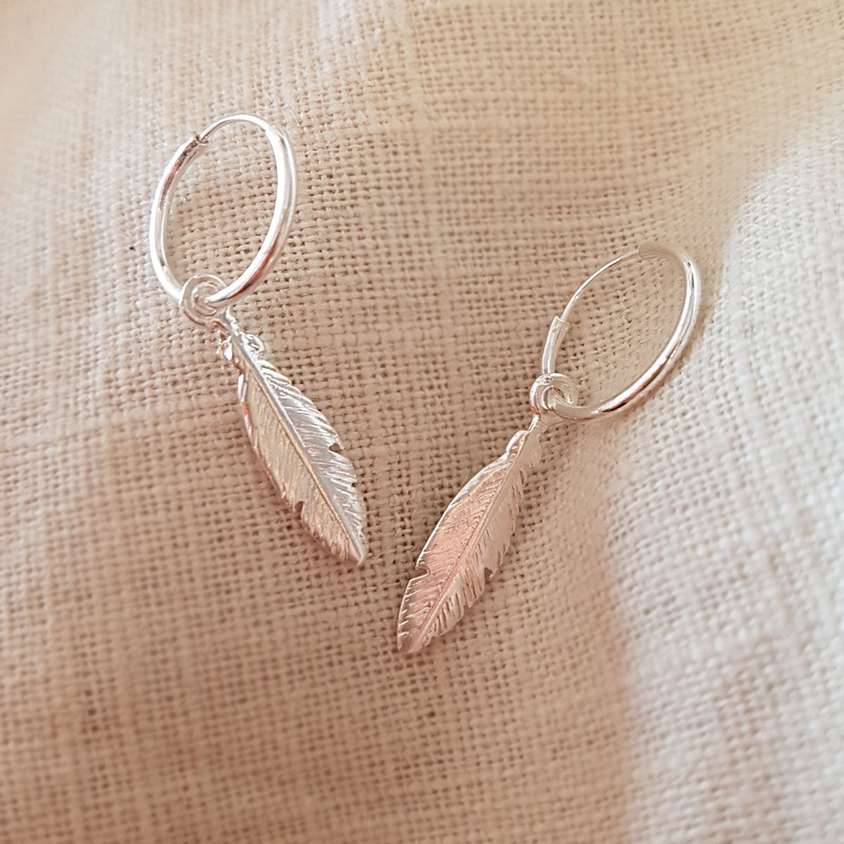 Oorringen met veertjes | 925 sterling zilver | 14 mm