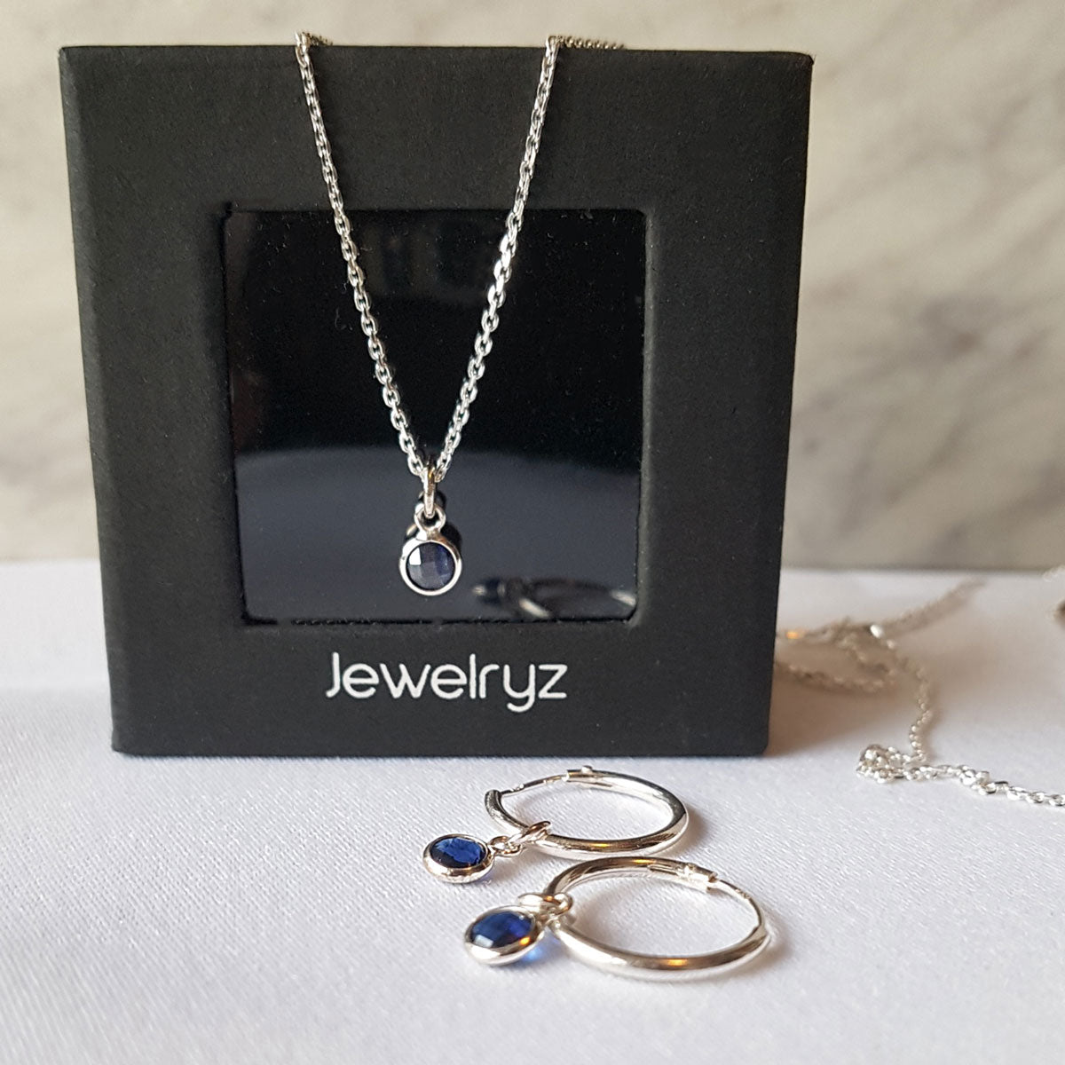 Celeste | Set ketting en oorringen met blauwe zirkonia | 925 zilver